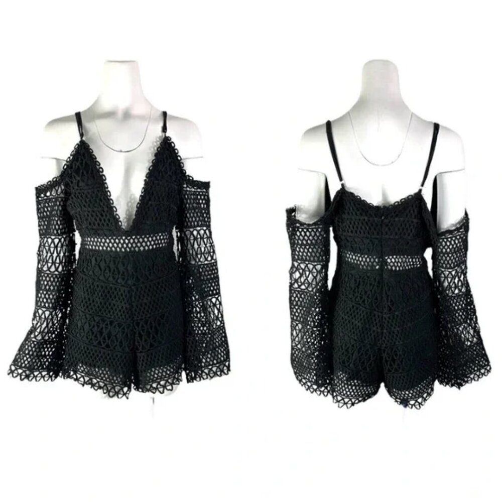 Black Crochet long sleeve romper. Size Large. From Boutique in Dallas